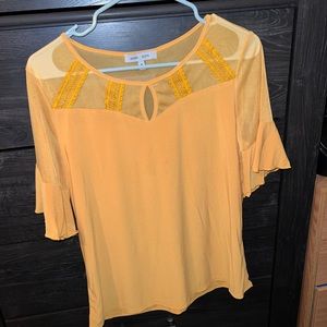 Orange blouse. Lightweight, and great condition! Only worn once.